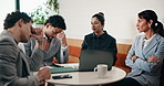Stress, laptop and business people in cafe for meeting with negative feedback on finance report. Computer, discussion and manager with financial advisors for review on investment loss in coffee shop.
