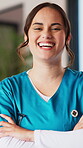 Medical, face or nurse in house with arms crossed, ambition or career growth in assisted living. Laugh, portrait or woman in home with confidence, opportunity or about us in healthcare services.