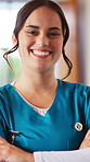 Happy, nurse and face of woman in house for assisted living, home care and medical support. Healthcare, crossed arms and portrait of person with pride for health service, career and caregiver job
