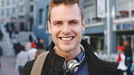 Commute, happy or businessman in city with face, optimism or morning travel in work routine. Windy, portrait and person in town with headphones, employee journey or positive attitude at start of day.