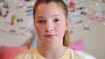 Bedroom, childhood and face of girl in home for positive attitude, wellness and relax on weekend. House, youth and portrait of child with calm, good mood and peace for development, growth and break