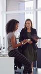 Tablet, notebook and business people in office with talk, HR administration and checklist for agenda. Women, discussion and tech in workplace with diary, teamwork and writing for human resources job.