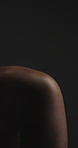 Shadow, woman and shoulder with skincare in studio for soft texture, smooth skin or feminine beauty. Mockup space, person and light for bodycare, healthy glow and dermatology shine on dark background
