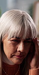 Headache, stress and woman on sofa in home with bad news, upset or mistake with failure in living room. Fatigue, pain and mature female person with migraine for burnout or exhaustion in apartment.