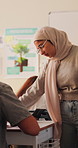 Muslim, woman and teacher in classroom with students, education or explain task for geography lesson. Islamic person, educator and talk in high school with teaching, advice or social science project.