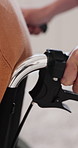 Caregiver, hands and patient in wheelchair, senior care and assisted living for recovery and health. Nurse, support and help for elderly person with disability, healthcare or rehabilitation in clinic