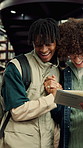 Handshake, education and men with book in library at university for studying, reading or discussion. Greeting, scholarship and male students with textbook for learning together on college campus.