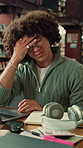 Frustrated, man and student with headache in library for overworked strain or studying. Tired, male person or academic learner with migraine, pressure or fatigue for education or assignment deadline