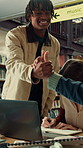 Library, handshake and student group greeting for studying, research and writing at university. Happy people, technology and gesture to join for assignment, education and books at college facility