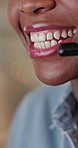 Consultant, mouth and black woman with headset for customer service or online advice. Closeup, female person or agent with smile or mic for virtual assistance, communication or support in call center