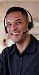Face, consultant or night of happy man with headset in call center for customer service or online advice. Portrait, male person or friendly agent working late with smile or mic for virtual assistance