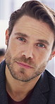 Man, face and smile at startup in office with confidence, pride and coworking with career at company. Person, happy and portrait at workplace, professional and project management at creative agency