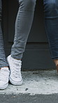 Hiring, legs and people with waiting outdoor for creative interview, job seeker line or onboarding. Recruitment, shoes and candidates in queue for career opportunity, design agency or startup vacancy