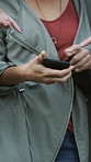 Hands, phone and sharing with people together for conversation, networking or pointing. App, information and research with friends talking for mobile communication, scrolling or typing text message