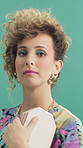Woman, face and beauty with retro style for makeup, cosmetics and aesthetic with makeup. Studio background, female person and portrait with pride for eye shadow, vintage fashion and attitude