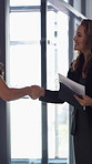 Happy woman, handshake and documents at office for welcome, talk and collaboration at finance company. Business people, shaking hands and smile with agreement, hiring or deal with paperwork at agency