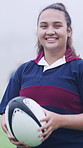Face, rugby and woman outdoor for sports, game training and confidence for wellness on pitch. Portrait, proud player and happy athlete with ball at field for exercise, practice and smile with fitness
