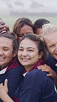 Laugh, face or sports team on field with hug, fitness hobby or collaboration in rugby match. Happy, diversity or women with embrace, competition solidarity or training support in outdoor game. 
