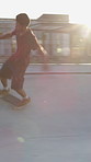 Man, skateboard and fast on ramp with turn, tricks or balance with riding at urban park. People, skater and extreme sports with exercise, practice and stunt in sunshine with summer training in city