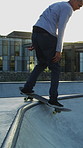 Teenager, skating and tricks with skateboard at park for fitness, exercise and practice skills. Smile, boy and skater for stunt performance, endurance training and extreme sports for weekend activity