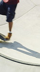 Legs, active and training with skateboard in city, hobby and athlete with skill development and ride. Outdoor, skater and people with tricks for extreme sport, performance or practice for competition