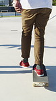 Skateboarding, start and legs in park with action, stability control and riding technique in fitness hobby. Back, man or skater with board, mobility performance and balance skills in Los Angeles.
