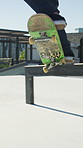 Legs, ramp and jump with skateboard in city, training and practice for skill development and fitness. Outdoor, skater and person with trick for extreme sport, performance and active for competition