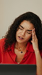 Woman, headache and glasses in home office with laptop, remote work and stress for wrong prescription. Person, computer and spectacles with blurry vision, migraine or challenge for freelance project.