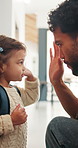 Father, child and high five in home with backpack, bonding together and getting ready for daycare. Dad, daughter and assistance in house with bag, morning routine and support for creche education.