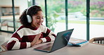 Laptop, headphones and child on video call in home for elearning, online class or education. Wave, happy and girl student with audio tech and computer for virtual lesson with greeting in house.