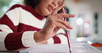 Child, hand and thinking with homework, pencil and writing answer with education for math assignment. Girl, notes and problem solving in home with notebook, knowledge growth and learning development.