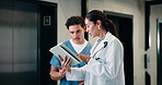 Doctor, team and discussion with tablet in hospital for medical results, procedure or planning. Man, woman or healthcare workers with technology for health advice, assistance or help in hallway