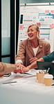 Woman, applause or cheers with meeting for analyst, celebration with graphs or success in office. Mature person, project management and motivation with documents for good news and stats for review