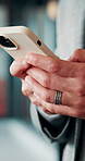 Phone, hands and businessman in office with texting, chatting or typing for email on mobile app. Technology, communication and male manager with online contact, feedback or review in workplace.