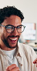 Excited, online and businessman with glasses in office, copywriting and positive feedback on website. Copywriter, cheering and happy person with fist pump, success and reading good news on laptop