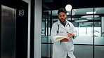 Running, man and doctor in hospital with documents for emergency treatment, surgery or procedure. Rush, paperwork and male healthcare worker with patient portfolio for medical service in clinic.
