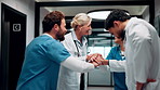 Medical, team and stack hands for success, celebration and applause for support in hospital. Healthcare, excited group and people together for milestone with mission, nurses or doctors clap for goal
