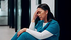 Healthcare, surgeon and woman with headache in clinic, overwhelmed or thinking of difficult surgery. Unhappy, doctor and person with migraine after operation mistake, guilt and exhausted in hospital