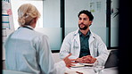 Doctor, team and discussion in hospital with laptop, medical research and stats for mortality rate. Healthcare, people and meeting in clinic with computer, data analysis and graphs for patient care.