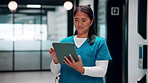 Nurse, woman and smile in hospital with tablet, typing patient medical report or research test results. Healthcare worker, person and scroll in clinic with tech, website and diagnosis for telehealth.