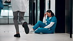 Healthcare, surgeon and woman with burnout in hospital, overwhelmed or thinking of difficult surgery. Unhappy, doctor and person with fatigue after operation mistake, guilt and exhausted in clinic