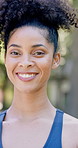 Face, athlete and woman with smile outdoor for fitness, exercise and morning routine. Portrait, female person and runner with confidence, positive attitude and happiness for sports training in nature