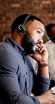 Stress, night and business man in call center for consulting, financial advisor and contact us. Office, burnout and person with headset for communication, finance advice and service with mistake