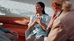 Support group, woman and talking in therapy, angry and counseling for trauma rehabilitation. Person with stress, psychology or share story in community center for mental health, anxiety or frustrated
