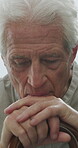 Thinking, prayer and cane with old man in home for grief memory, nostalgia and worship. Anniversary accident, reflection and walking stick with senior person with a disability for faith and religion
