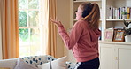 Dancing, happy and child with headphones in home for energy, practice and choreography. House, dancer and girl with music, audio and radio for movement, rhythm and streaming for hobby on weekend