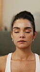 Yoga, calm and woman with meditation in house for holistic exercise, stress relief and inner peace. Wellness, person and grounding practice in home for mindfulness, spiritual healing or mental health