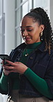 Texting, online and woman with phone in office, communication and chat with contact on social media. Typing, message and employee with internet connection, laugh and person with mobile in business
