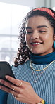 Typing, online and happy woman with phone in office, chat and communication with contact on website. Reading, message and employee with internet connection, laugh and person with mobile in business