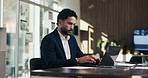 Finance, typing and businessman on laptop in office for budget planning, audit review and research. Accounting, documents and person on computer for financial report, proposal and tax evaluation
